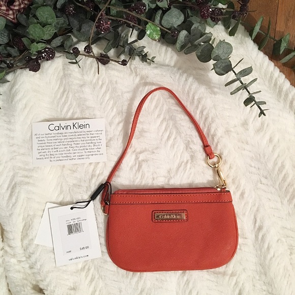 Calvin Klein Handbags - NWT Calvin Klein Clutch